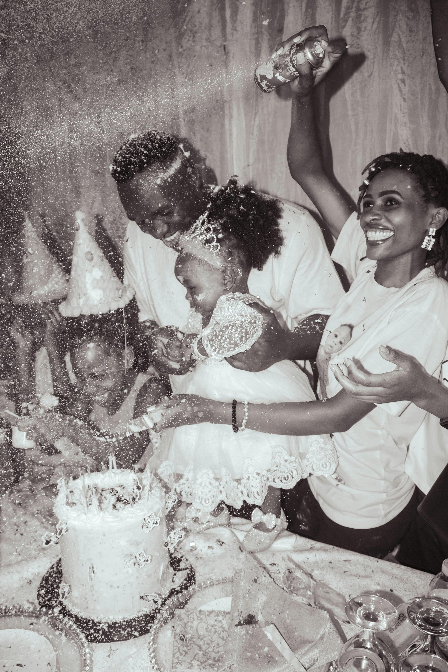 A photo of a family celebrating a child's birthday