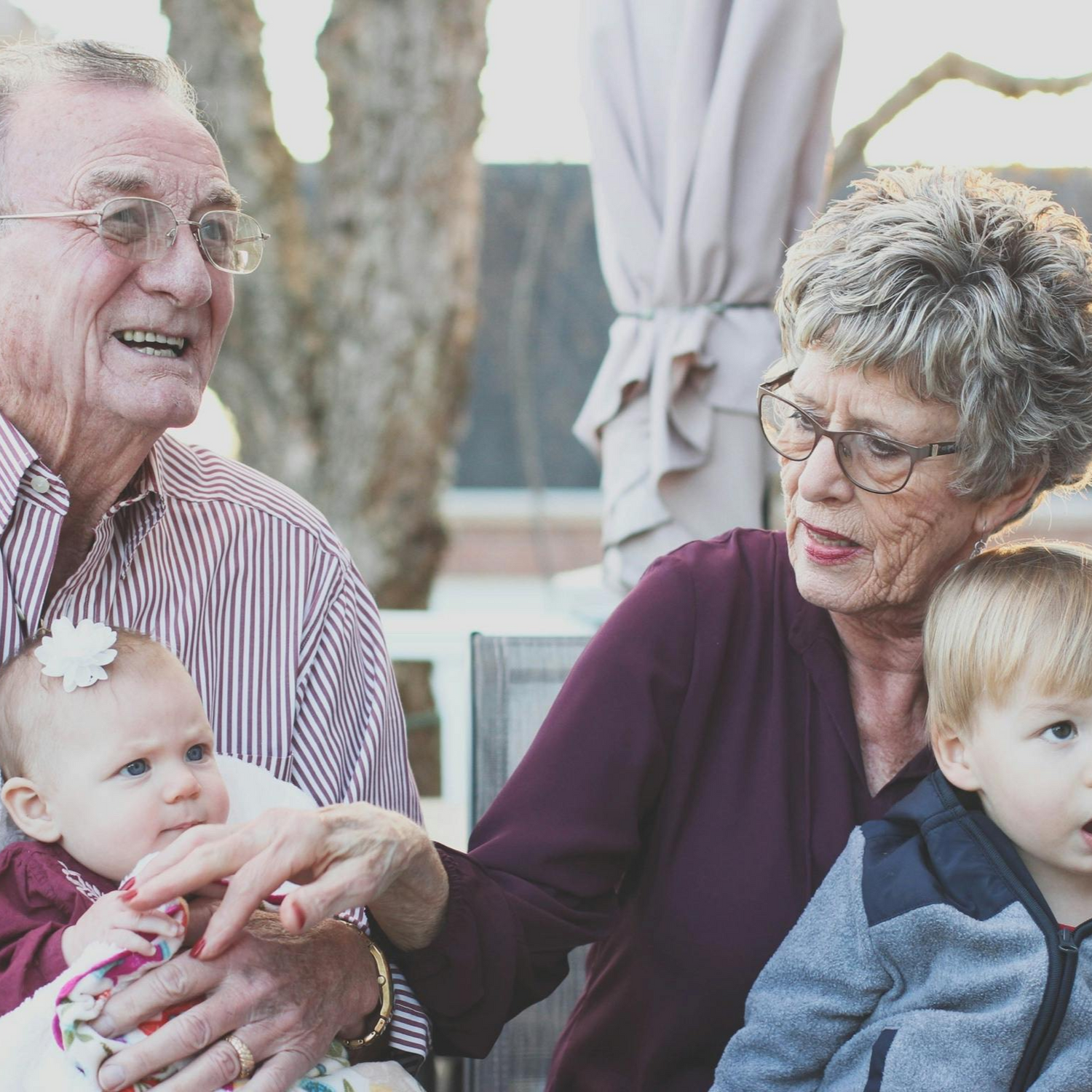 A photo of grandmother grandfather and grandchildren